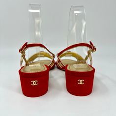 Chanel Red/Gold Metallic Sandals with Interlocking CC Logo on Block Heel Designer = Chanel Size = 36.5 Color = Red/Gold Material = Suede Condition = Very Good Location: Chicago Item Number: 14003-150 Item ID: 296131 Category: Sandals Chanel Sandals, Metallic Sandals, Cc Logo, Gold Material, Item Number, Red Gold, Red Color, Block Heels, Gold Metal