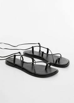 Leather straps sandals -  Women | Mango USA Mango Sandals With Heel Strap For Summer, Black Leather Open Toe Lace-up Sandals, Black Leather Lace-up Sandals For The Beach, Black Lace-up Sandals With Leather Sole, Luxury Black Leather Lace-up Sandals, Women Shoes Flats Sandals, Leather Strap Sandals, Mango Outlet, Wrap Sandals