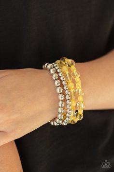 a close up of a person wearing a bracelet