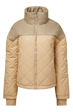 Ribbed hems with thumb holes keep in essential warmth and add a sporty finish to a puffer jacket finished with elegant diamond-quilt stitching. Funnel neck Long sleeves with ribbed hems Front zip closure Polyester/nylon Machine wash, tumble dry Imported Cream Quilted Puffer Jacket For Winter, Quilted Cream Puffer Jacket For Winter, Fall Quilted Down Jacket With Ribbed Cuffs, Winter Cream Quilted Puffer Jacket, Quilted Down Jacket With Ribbed Cuffs, Beige Nylon Puffer Jacket With Padded Collar, Beige Puffer Jacket With Double-lined Hood And Long Sleeves, Beige Long-sleeved Puffer Jacket With Padded Collar, Bungee Cords