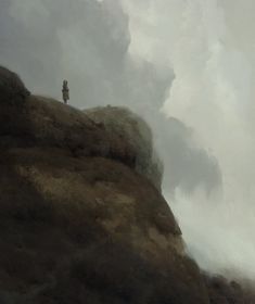 a lone person standing on top of a hill in the middle of cloudy skies above