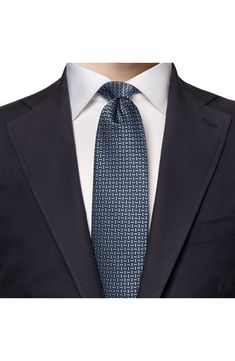 A geometric design lends texture and distinction to a sophisticated tie woven from lustrous Italian silk. 58" length, 3" width 100% silk Dry clean Made in Italy Luxury Ties For Office Suit Accessories, Luxury Ties For Workwear, Luxury Standard Tie For Work, Designer Workwear Ties, Designer Semi-formal Suit And Tie Accessories, Luxury Tailored Ties For Semi-formal Occasions, Luxury Silk Ties For Office, Luxury Silk Mark Certified Ties For Business, Designer Suit And Tie Accessories For Semi-formal