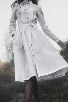 This midi dress is cut for fit&flare silhouette from airy white linen and has a belt to define waist. Priest collar and dramatic ruffles at the chest give Victorian times feeling for the dress. It is perfect for casual days to wear with sneakers or to dress up for your special family occasions: birthdays, baptism, christening or even wedding. DETAILS ♡ Handmade with attention to every detail ♡ Tie belt ♡ Priest collar ♡ Easy and breathable linen FABRIC Available in any color from the list. W Formal Linen Dress, Wedding Guest Dress Boho, Fairy Dresses For Women, Midi Dress Modest, White Victorian Dress, Dress Goddess, Boho Dress Plus Size, Pagan Clothing, Modest Wedding Dress