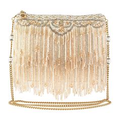 Layers of beaded fringe and faceted crystals create a beautiful bag that is ready to shimmy and shake on the dance floor or walk down the aisle. The elegant craftsmanship makes this crossbody handbag as unforgettable as your big day! 9 x 1.25 x 7"Strap Length End to End: 49"Strap Drop: 23"Removable crossbody chain strap, zipper closure, inside pocket, metal logo fob, protective storage bag, certificate of authenticity, fits a phoneThis is a handmade item, each one an individual work of art. Slight variations may occur. Homecoming Accessories, Flapper Accessories, Crystal Fringe, 1920s Outfits, Prom Accessories, Western Accessories, Mary Frances, Timeless Classic Style, On The Dance Floor