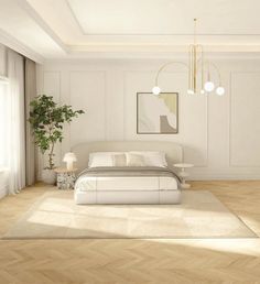 a bedroom with white walls and wood flooring has a large bed in the middle