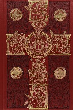 a red and gold book with an image of jesus on the cross, surrounded by other symbols