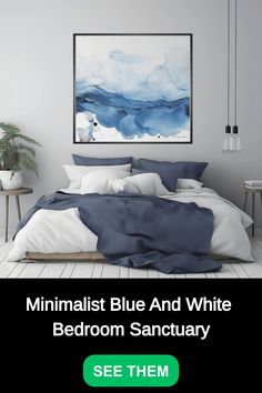 Minimalist blue and white bedroom with abstract blue wall art above the bed.