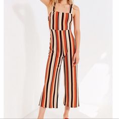 Condition: Nwt Perfectly Striped Jumpsuit From Uo Featuring A Summer-Ready Sleeveless Silhouette. Features A Square Neckline And A High-Rise Waist. Finished With Cropped, Wide Legs + A Zip Accent On The Back! Orange Summer Jumpsuit Overall, Orange Summer Overalls Jumpsuit, Summer Orange Overall Jumpsuits And Rompers, Trendy Orange Jumpsuits And Rompers For Beach, Trendy Fitted Orange Jumpsuits And Rompers, Chic Orange Fitted Jumpsuits And Rompers, Orange Fitted Chic Jumpsuits And Rompers, Fitted Orange Sleeveless Jumpsuits And Rompers, Fitted Sleeveless Jumpsuits And Rompers By Urban Outfitters