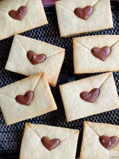 cookies with chocolate in the shape of an envelope on a cooling rack, ready to be eaten