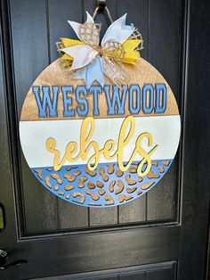 a door with a sign that says westwood relishs and leopard print on it