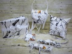 three bags with white and black designs on them