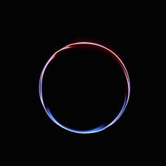 a blue and red ring in the dark