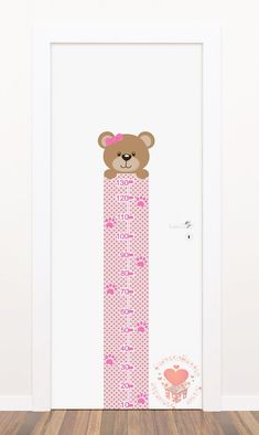 a door with a teddy bear sticker on it's side and the word love is