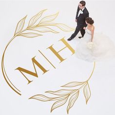 a bride and groom standing in front of the logo for their wedding ceremony at the hilton hotel