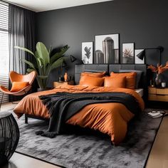 an orange and black bedroom with modern decor