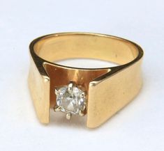 "- Lovely 14k Yellow Gold Modernist Style Old Mine Cut Diamond Ring - Ring Size 8.5 - Ring marked \"BB 14k\" - Six prong set old mine cut diamond measuring 5.47mm by 12mmx 4.10mm, carat weight .55ct - Diamond Clarity = SI-2, Diamond Color = K-L - Ring mounting measures 9.30mm in width at top tapering to 5.60mm at base - Ring weighs 8.3 grams - Ring is in very good to excellent vintage condition" Antique Jewelry Rings, Emerald Ring Gold, Old Mine Cut Diamond, Gold Statement Ring, Gold Band Ring, Sterling Silver Cuff, Recycled Gold, Silver Cuff Bracelet, Diamond Color