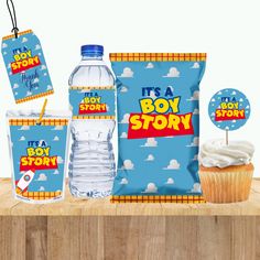 it's a boy baby shower party package with cupcakes and water bottle