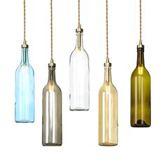 four different colored glass bottles hanging from strings