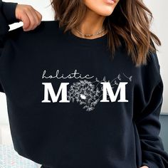 Holistic Mom sweatshirt, These warm, super soft sweatshirts are incredibly comfy! . The collar is ribbed knit, so it retains its shape even after washing. There are no itchy side seams on these sweaters.  .: 50% cotton, 50% polyester .: Medium-heavy fabric .: Loose fit .: Sewn-in label .: Runs true to size Mother's Day Casual Long Sleeve Sweatshirt, Casual Black Sweatshirt For Mother's Day, Casual Long Sleeve Sweatshirt For Mother's Day, Casual Crew Neck Sweatshirt For Mother's Day, Holistic Mom, Natural Mama, Crunchy Mom, Crunchy Mama, Crunchy Moms