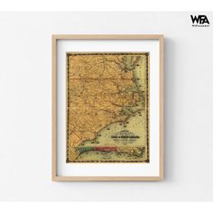 an old map of the state of new jersey in a wooden frame on a wall