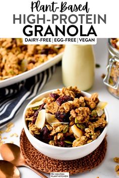 a bowl filled with granola sitting on top of a table