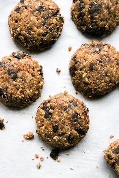 several cookies are arranged on a baking sheet