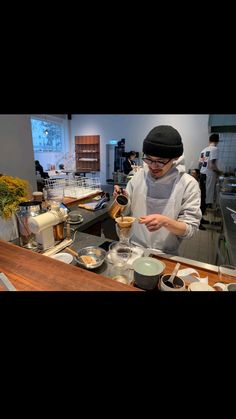 a person preparing food in a kitchen