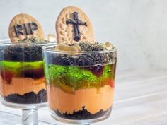 two desserts with cookies and candy in them