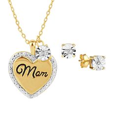 Celebrate all she means to you...A stunning gold-plated heart pendant studded with sparkling diamonds. The heart frames the word "MOM", making this a beautiful way for her to remember your love for her each time she wears it. A sumptuous presentation pouch — perfect for gift-giving and safekeeping — and a matching 18" chain are included at no additional charge. Gold Cubic Zirconia Jewelry Set For Valentine's Day, Heart-shaped Jewelry Sets For Wedding And Mother's Day, Heart-shaped Cubic Zirconia Jewelry Sets For Anniversary, Mother's Day Gold Plated Heart Cut Jewelry, Mother's Day Anniversary Cubic Zirconia Jewelry Sets, Gold Plated Heart Cut Jewelry For Mother's Day, Gold Heart Pendant Jewelry Set For Anniversary, Anniversary Gold Jewelry Set With Heart Pendant, Gold Jewelry Sets With Heart Pendant For Anniversary