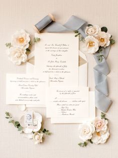 wedding stationery with flowers and ribbon