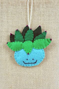 an ornament with a plant on it