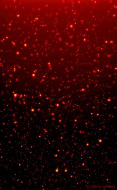 red and black background with lots of small dots on it's surface, as well as an orange light in the center