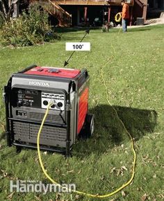 an invertible generator is on the grass near a house