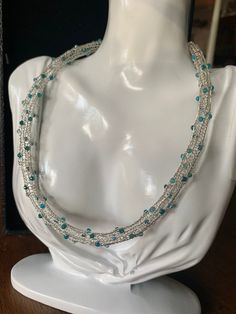 "I have crocheted from stainless steel wire this necklace with beautiful faceted green onyx! This word is hypoallergenic, so lightest, won't tarnish and it's affordable The onyx had a lovely sparkle The necklace measures approximately 18\" in length.  There is a lobster claw closure. Shipping is free within the USA. Thank you for looking!" Multi-strand Crystal Beaded Necklace For Gift, Sterling Silver Turquoise Necklaces With Faceted Beads, Handmade Necklaces With Round Beads For May Birthstone, Handmade Necklaces With May Birthstone Round Beads, Handmade May Birthstone Necklaces With Round Beads, Handmade Turquoise Briolette Necklace, Faceted Multi-strand Necklace As Gift, Faceted Multi-strand Necklace For Gift, Elegant Turquoise Wire Wrapped Beaded Necklace