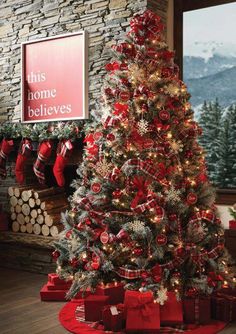 a decorated christmas tree with presents under it