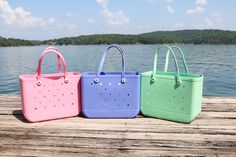 Our summer Bogg colors are here and we are obsessed! Trendy Tote Bag For Outdoor Activities, Summer Tote Bags For Outdoor Activities, Summer Outdoor Tote Bag, Large Capacity Bags For Summer Outdoor Activities, Waterproof Summer Bags, Summer Outdoor Activities Bag, Pink Tote Bag For Outdoor Activities, Pink Everyday Bags For Beach Season, Pink Bags For Everyday Beach Season