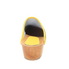 "The Maja is a hand-made open back, classic wooden clog sandal in genuine leather. * Hand-made in Europe * Genuine leather * 2\" heel * Wood outsole with rocker bottom to propel foot forward * Wood harvested from sustainable European forests ---> Ships in 1 business day <----- Sizing tip: This clog is based on the German Fussform shape, so the toe area is bigger and wider overall. If you have a narrow to a narrow/medium width foot, then it is recommended to go down one size. EU US Women's Wooden Clogs With Open Heel, Yellow Open Toe Clogs With Rubber Sole, Yellow Clogs With Wooden Heel And Round Toe, Yellow Leather Closed Toe Clogs, Yellow Leather Mules With Wooden Heel, Yellow Leather Open Toe Clogs, Sweden Fashion, Swedish Clogs, Clogs Style