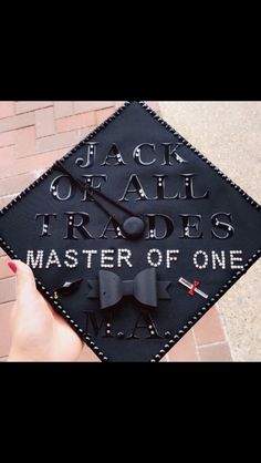 a black graduation cap with the words, jack o'all trades master of one