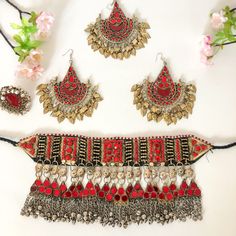 Afghani Kuchi Jewelry Set. A perfect gift for yourself, friends and family!  It is a beautiful 5 piece set that includes necklace/choker, earrings, a ring, and a headpiece.  It comes in three different colours, red, blue and green.  It is a perfect set for Henna night, wedding events and special occasions like Nawruz and Engagements. Costume Jewelry Metal Bridal Sets, Festive Wedding Jewelry With Decorative Details, Festive Wedding Jewelry, Festive Decorative Wedding Jewelry, Festival Costume Jewelry Choker, Handmade Temple Jewelry For Party, Metal Bridal Sets As Gift, Traditional Decorative Wedding Jewelry, Bohemian Gold Jewelry Sets For Wedding