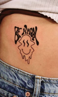 a woman's stomach with the word be ready tattooed on it