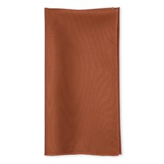 an orange napkin on a white background