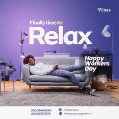 a man laying on top of a couch in front of a purple wall with the words relax