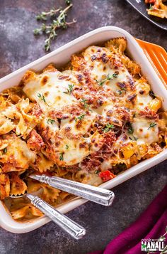 a casserole dish with meat and cheese