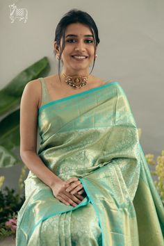 Drape in the charm of Paasi Pacchai Kanchipuram Tissue Saree, an earthy hue associated with nature, calmness, and tranquility, weaving a story of grace in every fold, adorned with a Zarigapettu border. Green Tissue Silk Saree, South Indian Pattu Sarees, Green Saree Engagement Look, Pista Green Pattu Saree, Pastel Sarees For Wedding, Green Bridal Saree South Indian, Trending Pattu Sarees, Green Saree Wedding, Green Kanjivaram Saree Silk