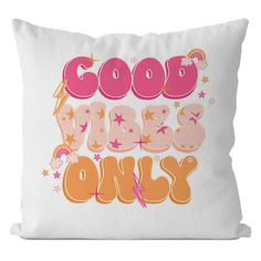 a white pillow with the words good vibes only printed in pink and orange on it