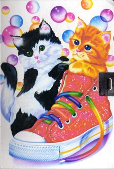 an image of two cats playing with bubbles on a boarder sheet that has been painted