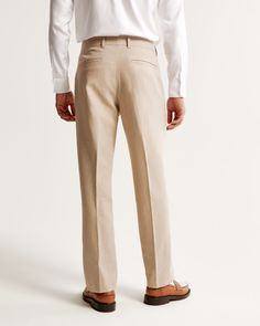 Our classic suit pants in our linen-blend fabric. Tailored easy fit through the leg with a slight taper, featuring a shorter inseam designed to hit at the ankle and give a cleaner visual. For a standard visual, choose a longer inseam. Suit Pant, Mens Linen, Classic Suit, Suit Pants, Abercrombie Fitch, Linen Blend, Mens Pants, Pants, Fabric