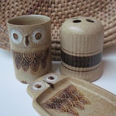 an owl themed ceramic container and dish set