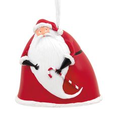 a santa clause ornament hanging on a white background with red and black accents