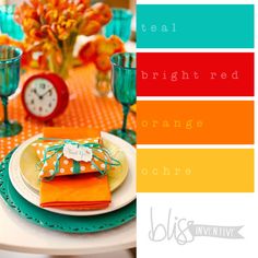 the table is set with orange and green plates, napkins, and place settings